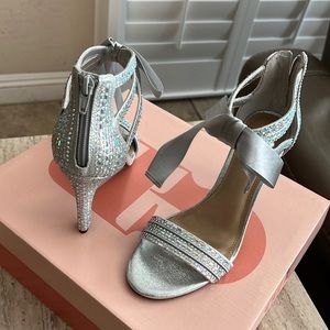 Silver sequins heels.